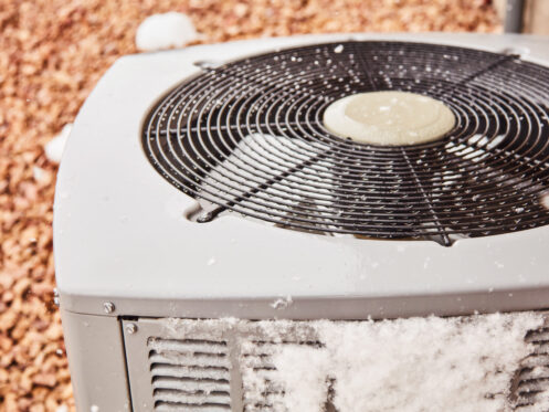 An AC unit covered in ice